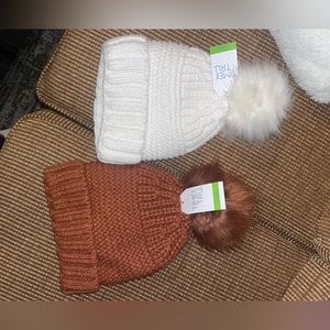 Two brand new beanies